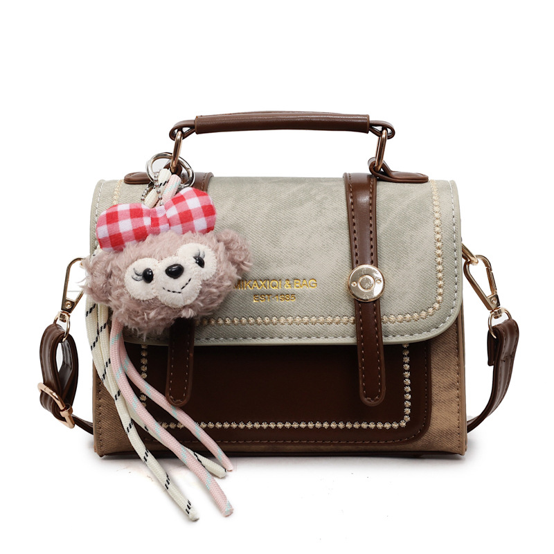 Bolso de mano doble estilo inglés de estilo extranjero 2025, otoño y invierno nuevo estilo de bolso de mujer relajado, bolso de hombro casual.