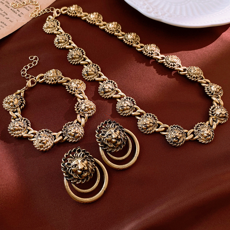 Medieval vintage silver needle lion head earrings