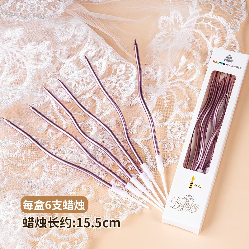 Curva de oro rosa vela