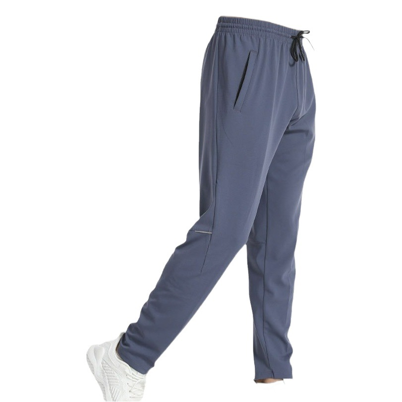 Pantalones deportivos de secado rápido de color sólido Otoño de los hombres Nuevos pantalones sueltos de entrenamiento de baloncesto fitness al aire libre pantalones casuales hombres