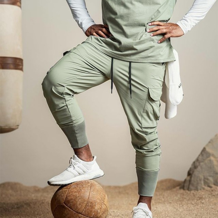 Transfronterizos europeos y americanos multi-bolsa pantalones cremallera pantalones de pierna cerrada moda casual de secado rápido transpirable correr Pantalones deportivos para hombres