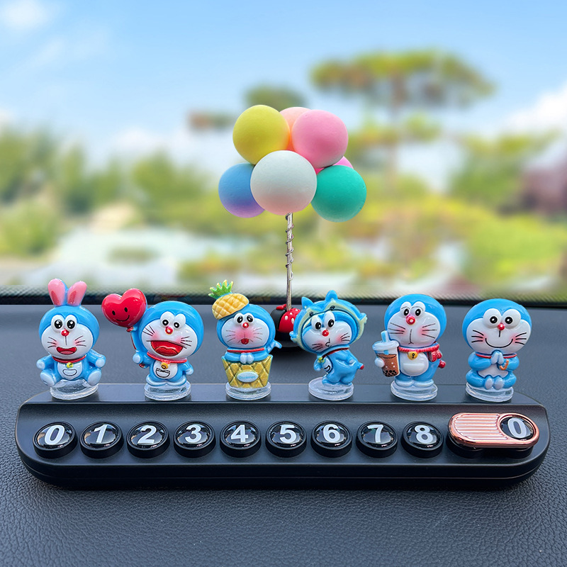 Doraemon decoración de accesorios de coche nuevo coche de niña creativo lindo muñeca de consola central decoración de coche