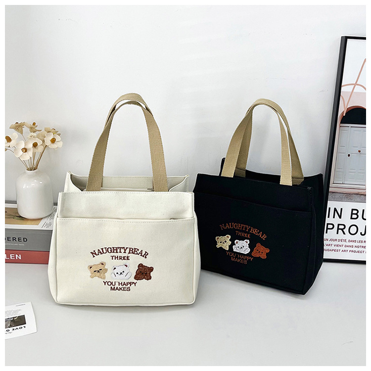 New wholesale fashionable and high-quality canvas handbag, simple and portable, easy to carry for going out, versatile lunch box and bento bag undefined