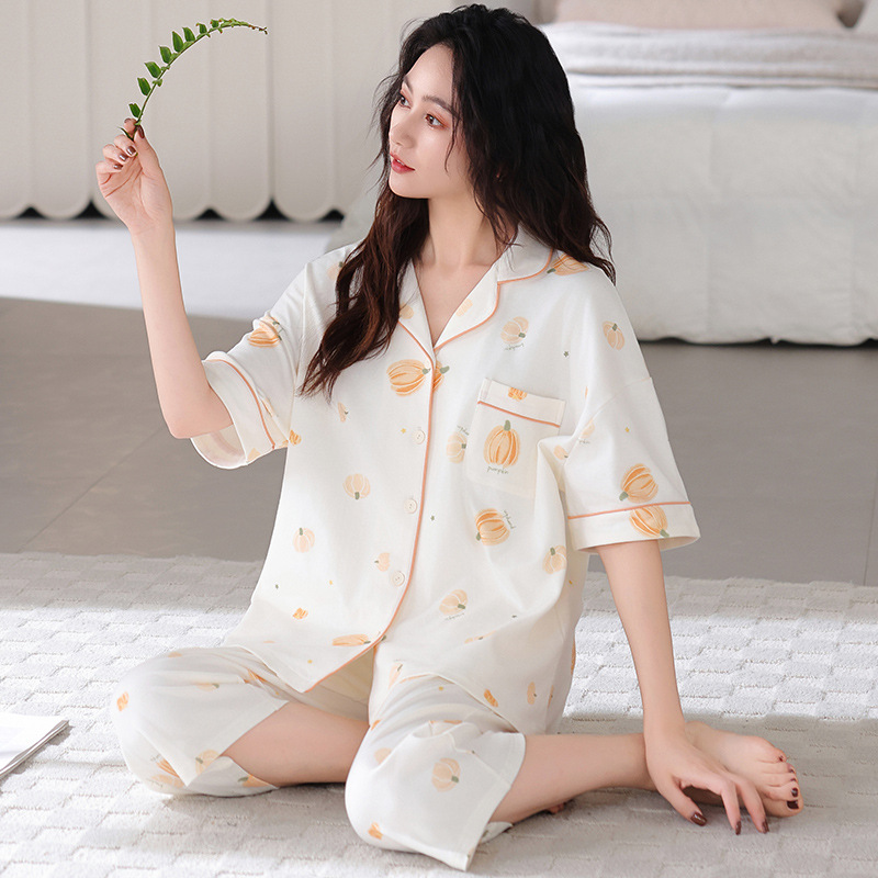 Pijama de algodón delgado para mujeres de verano de manga corta set de pantalones de siete puntos de lazos de mediana edad y la ropa del hogar de verano más grande