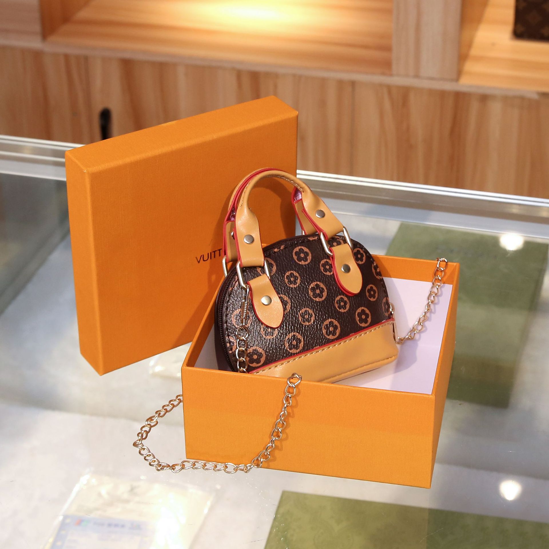 Moda explosiva, lujo ligero, retro, mini bolso pequeño, sentido de alta gama, presbiterio, temperamento de nicho, monedero diagonal portátil