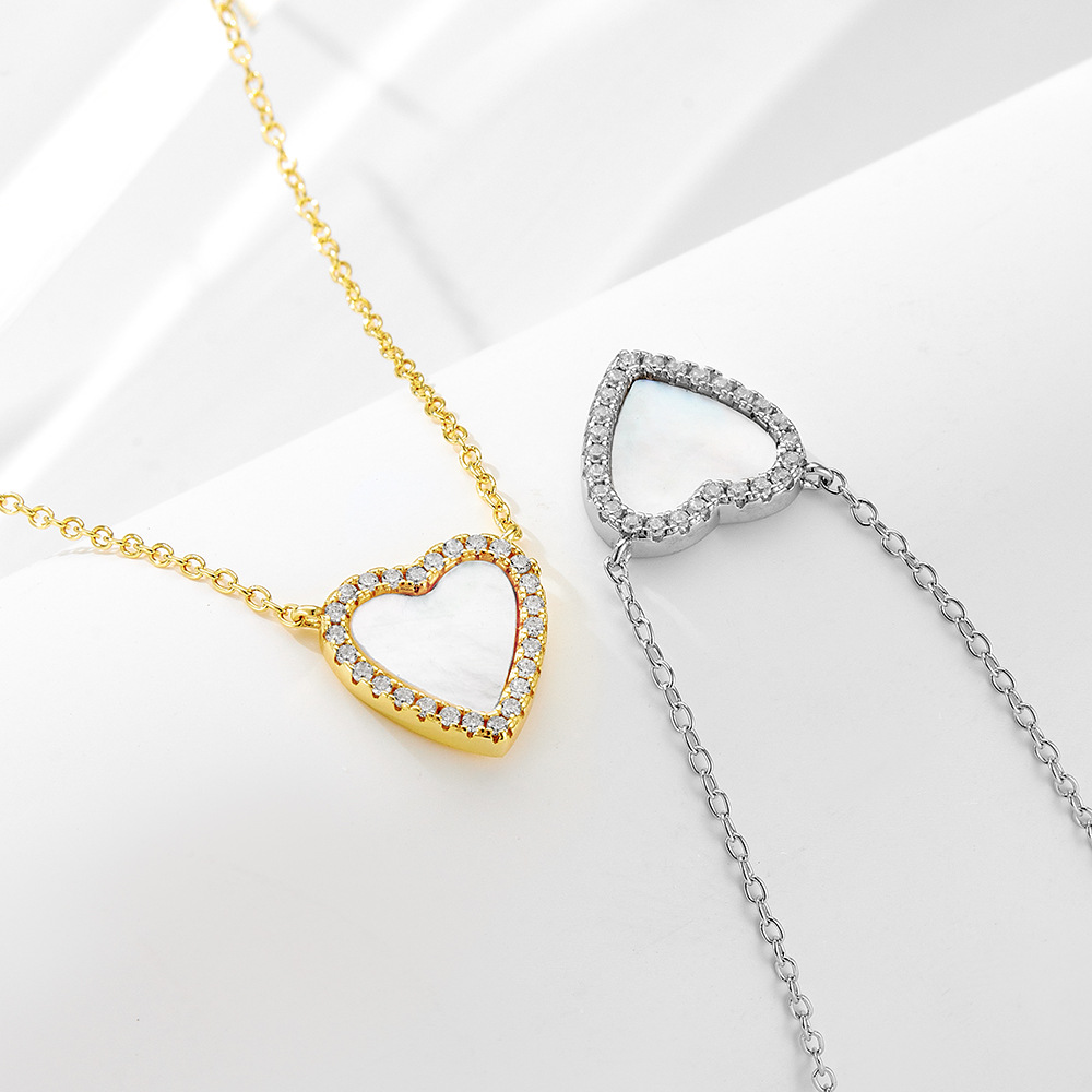 S925 collar colgante de concha en forma de corazón de amor de plata de ley femenino europeo y americano, lujo ligero, cadena de clavícula de todo fósforo con incrustaciones de diamantes de alta gama
