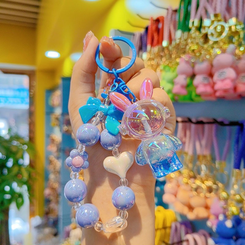 Auriculares de perlas conejo - azul rosa