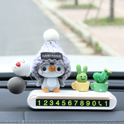 Nömrəli dayanma kartı car license plate, phone number - gray-capped-penguin-white-parking-sign-green-plants