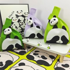 可爱熊猫手提包女针织毛线水桶包日韩版百搭手拎休闲托特包盒饭袋