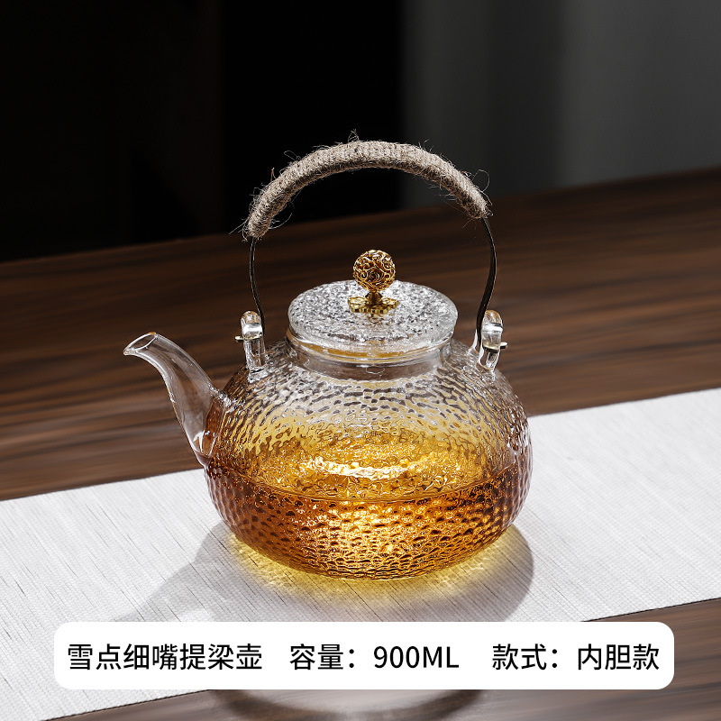 Venta directa de fábrica Tetera de vidrio con alto contenido de borosilicato Tetera de espuma con patrón de martillo de viga de elevación de metal Tetera de vidrio de alta calidad para el hogar