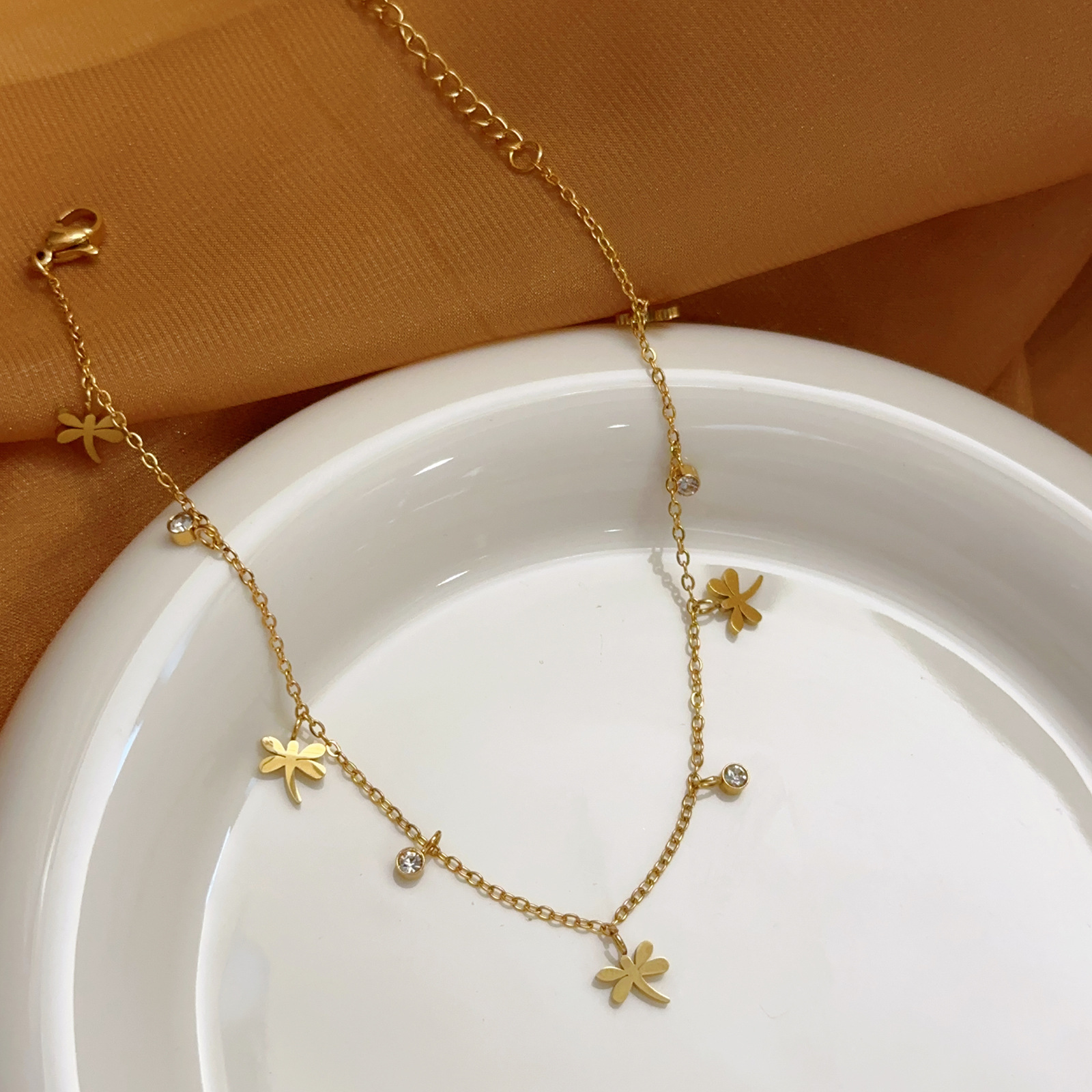 Amazon venta caliente libélula tobillera mujer 18k oro pequeña margarita joyería fresca y dulce cadena de pies sexy ins