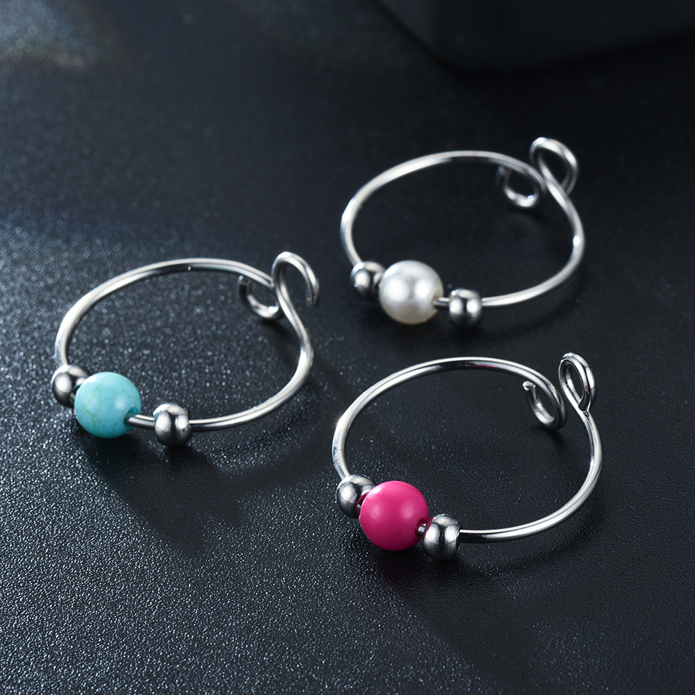Creative Titanium Steel Rotatable Pressure Anti-anxiety Live Pearl Turquoise Ball Ring display picture 1
