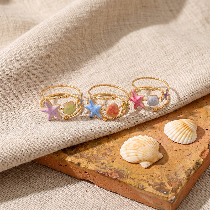Tina Europa y los Estados Unidos color transfronterizo goteo estrella de mar anillo de nicho de diseño de vacaciones marinas joyas al por mayor mujeres