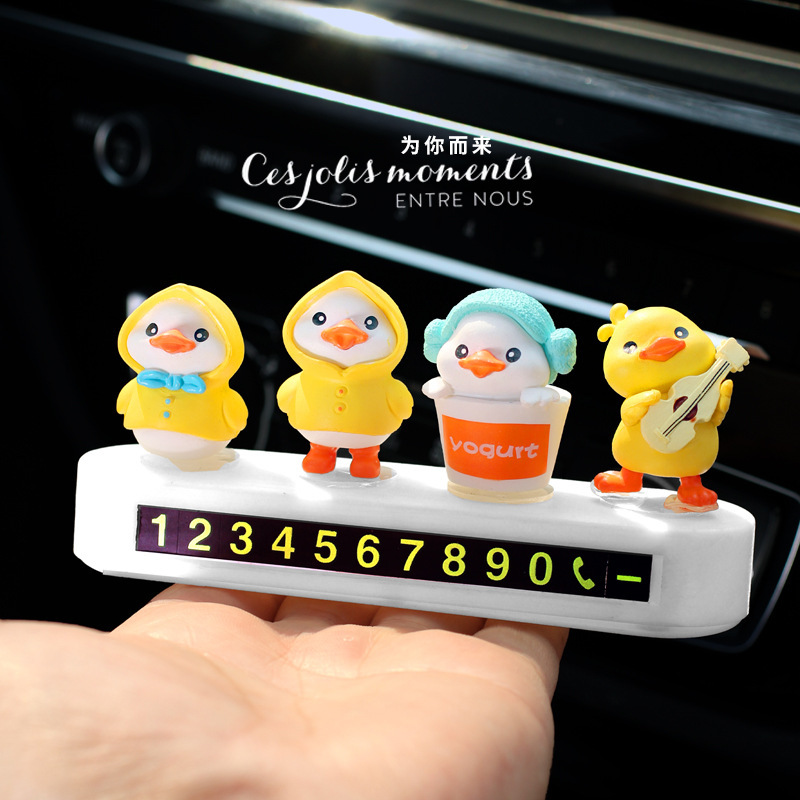 Adorno de pato amarillo montado en automóviles placa de estacionamiento temporal placa de estacionamiento de automóviles tarjeta telefónica de movimiento de automóviles caricatura en línea mujer