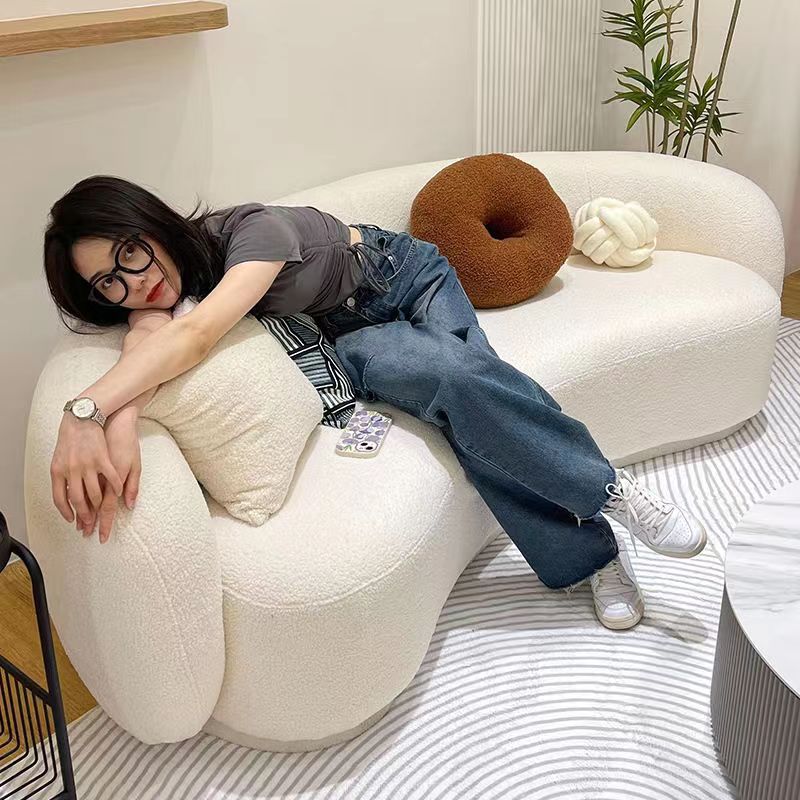 Sala de estar nórdica pequeña casa de tecnología tela salón de belleza tienda de boda sala de estar semi-arco cachemire sofá de cachemire