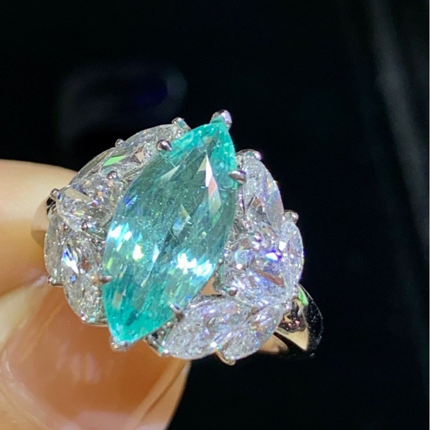 New arrival 18K gold mysterious walking neon blue Paraiba ring