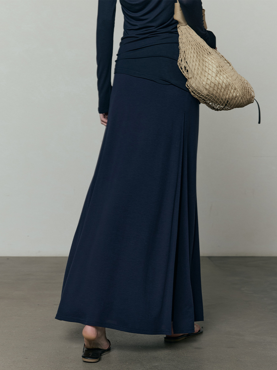 広州十三行婦人服UMA白ストール2025夏の新作スカート女性のテンセルハイウエストロングスカート