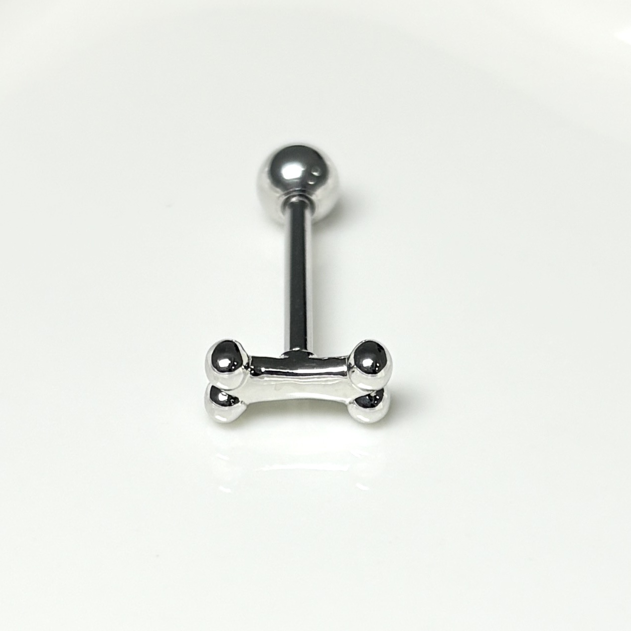 Pointed labret stud close-up product detail