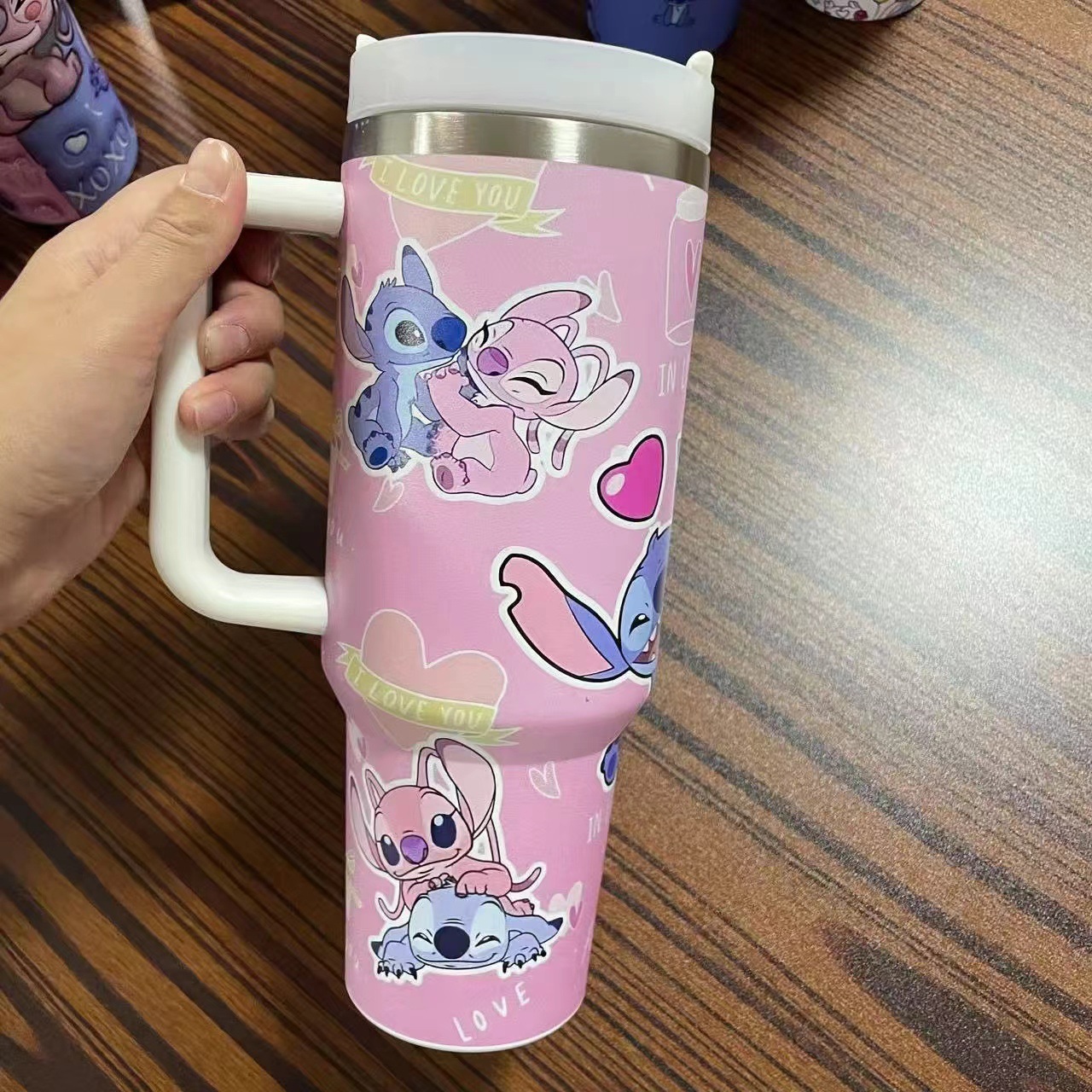 Transfronterizo Amazon 40oz Sanrio dibujos animados KT gato serie termo taza de hielo taza de café portátil con mango
