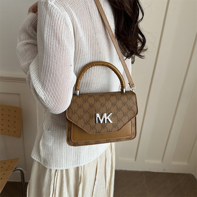Nueva bolsa de hombro 2026 primavera y verano nuevo nicho de diseño bolso de mochila de moda simple bolso de tendencia de mujer