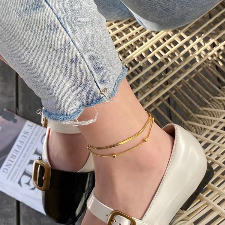 Pie de acero de titanio simple de doble capa que no se desvanece, anillo de pie de sentido avanzado para mujer, diseño de nicho, cadena de pie 2024, nueva tendencia