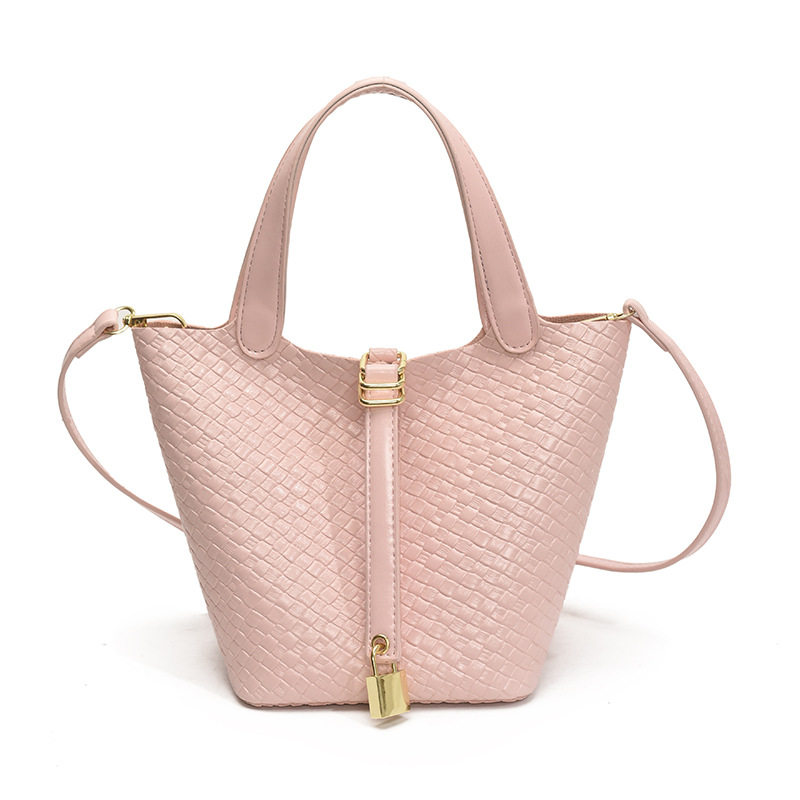 Bolso de cubo portátil con patrón tejido para mujer 2025 nuevo estilo coreano de lujo ligero de alta gama bolso de mensajero para niños de nicho