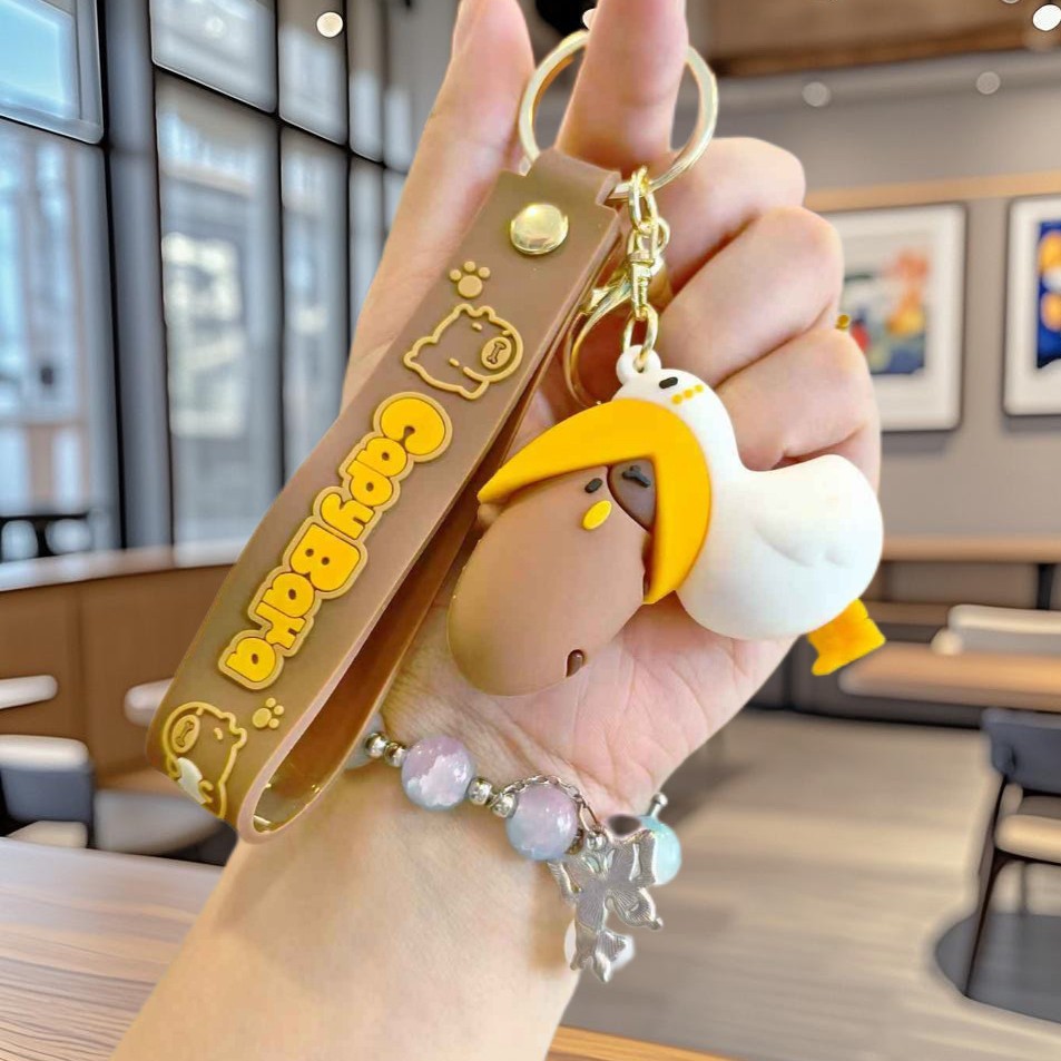 Nuevo llavero de Kapibala pareja mochila escolar colgante lindo capibara muñeca de PVC llavero de coche al por mayor