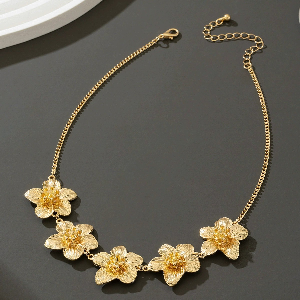 Europa y los Estados Unidos moda transfronteriza venta caliente flor simple personalidad universal mujer raqueta de calle conjunto de decoración joyas de moda