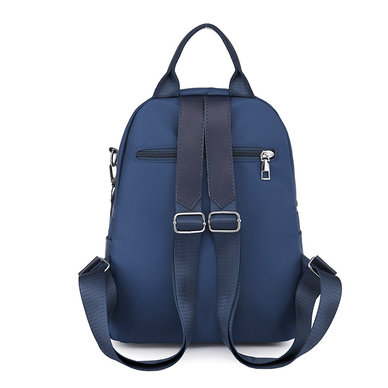 2023 verano nuevo estilo coreano casual Oxford tela mochila femenina moda simple mochila de viaje multifuncional al por mayor