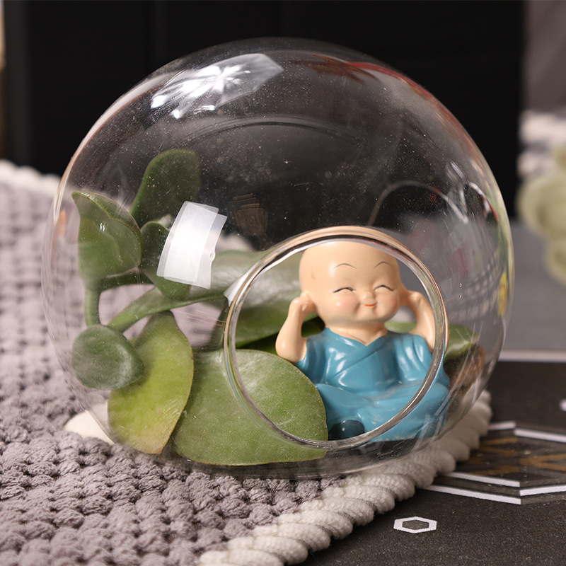 Wall hanging glass ball
