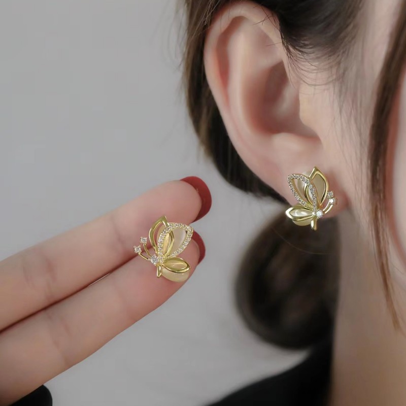 Aguja de plata S925 Corea del Sur Dongdaemun nuevos pendientes de arco pendientes de ópalo huecos tridimensionales de moda para mujer