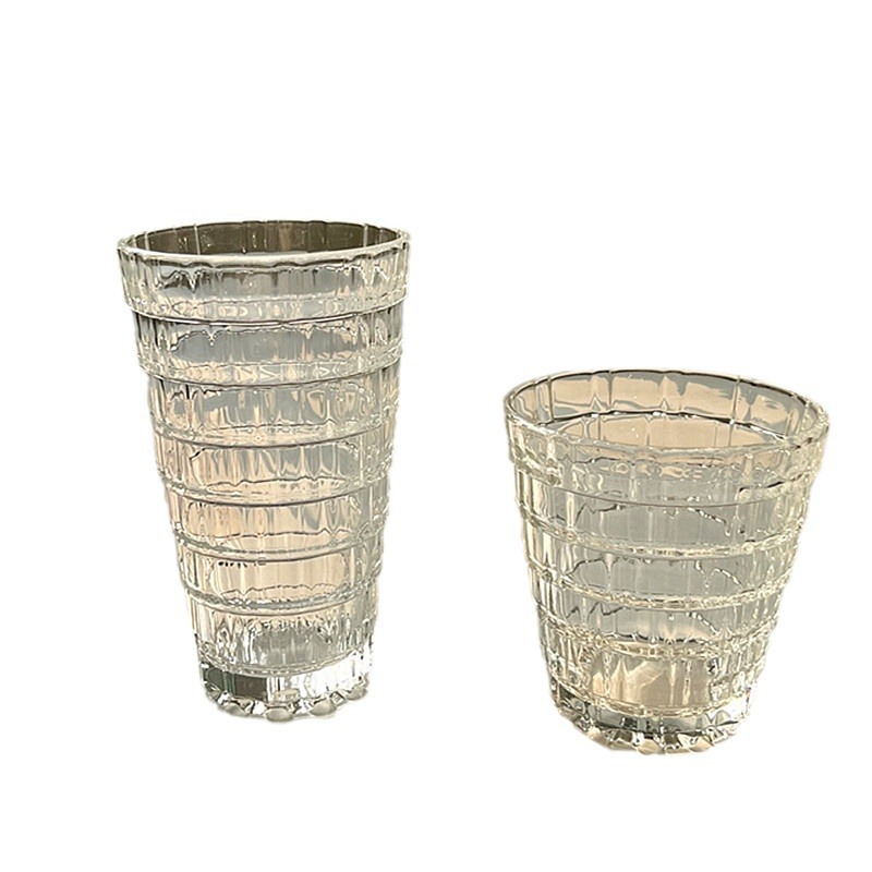 Nuevo estilo de nicho taza apiladora de estilo ins taza de agua de cristal tallado taza de agua de vidrio en relieve femenino de alto valor taza de jugo