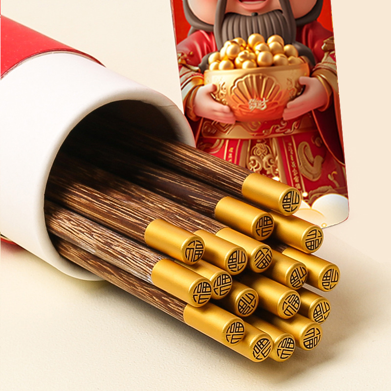 Palillos de regalo de año nuevo Palillos de madera de ala de pollo, caja de regalo, palillos festivos de madera maciza, sin pintura, sin cera, impresión antideslizante LOGO al por mayor