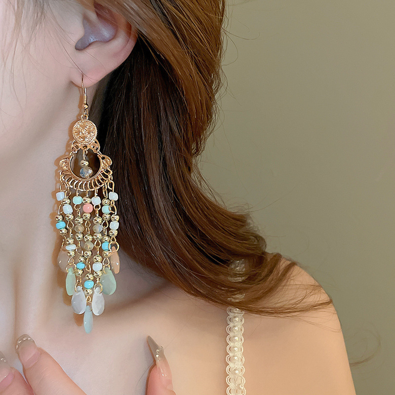 Pendientes de borla de media luna de fénix de estilo étnico Pendientes de diseño retro de nicho Pendientes de lujo ligero femenino de verano