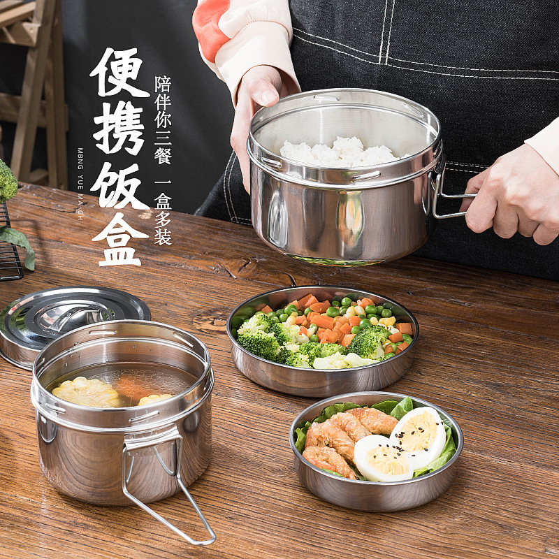 ステンレスの丸い弁当箱のネジ口を厚くして、新鮮保持収納箱を密封してキャンプします。|undefined