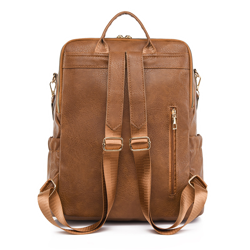 Comercio exterior al por mayor 2023 nuevo estilo coreano retro damas PU mochila de viaje al aire libre simple de moda