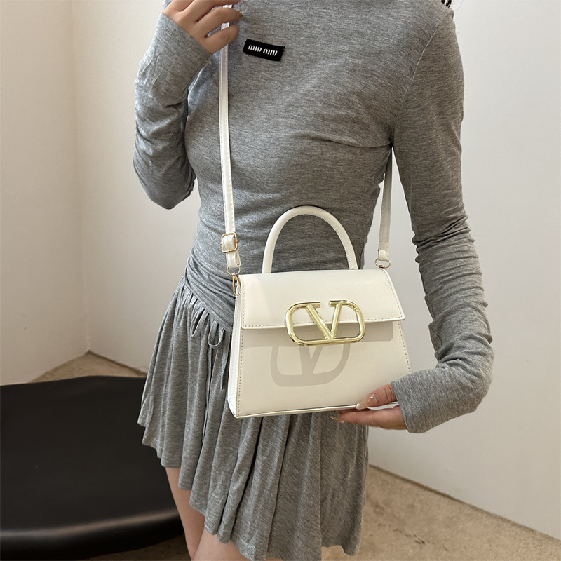 Bolso de mujer 2024 nueva primavera y verano popular nicho bolso de hombro de moda textura versátil bolso de mujer