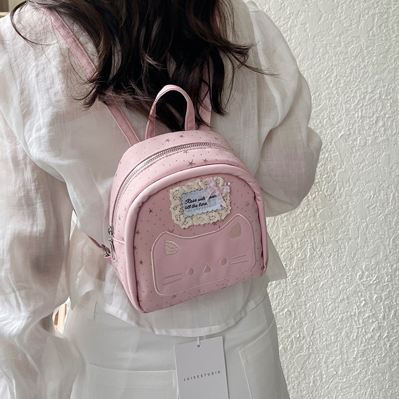 2026 nuevo gatos bordados mochila rosa brillante estrella mini mochila de la niña viento lindo jardín de infantes mochila pequeña