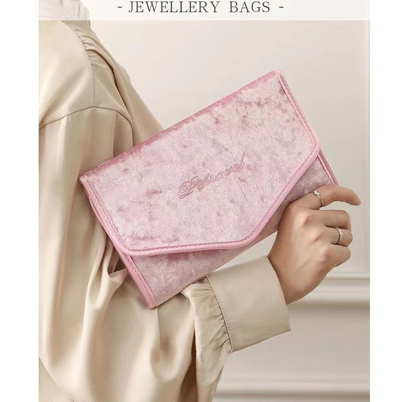 Bolsa de joyería portátil para viaje, caja de joyería para el hogar, bolsa plegable multifuncional para collares y pendientes.