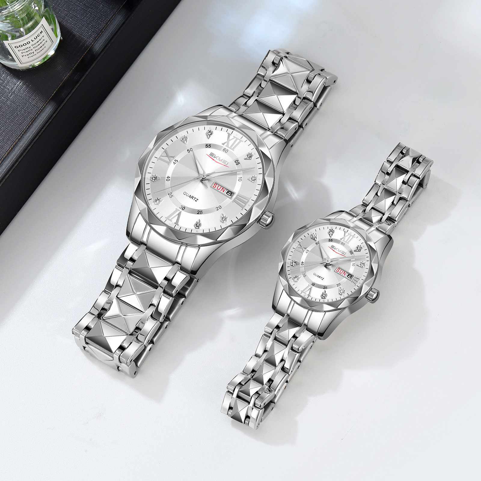 Momento de belleza pareja impermeable reloj calendario de luz nocturna reloj de pulsera transfronterizo caliente reloj de cuarzo fuente de fábrica al por mayor