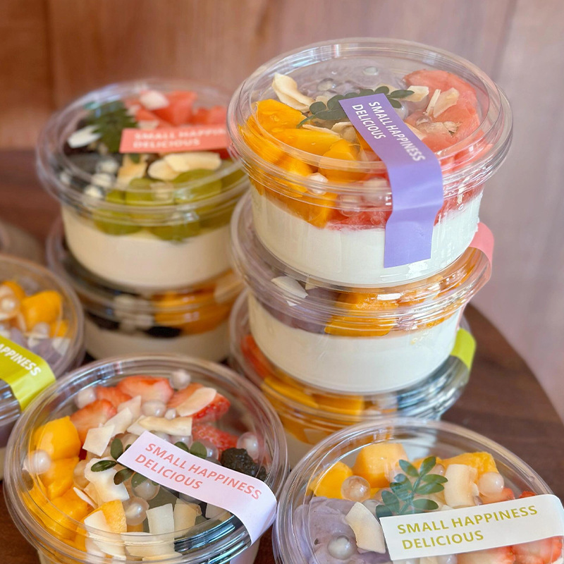 Taza de congelación de leche de coco, tazón de yogur extraído en frío, polvo de hielo asado, hierba de仙境, fruta pescada, postre, caja de embalaje transparente desechable