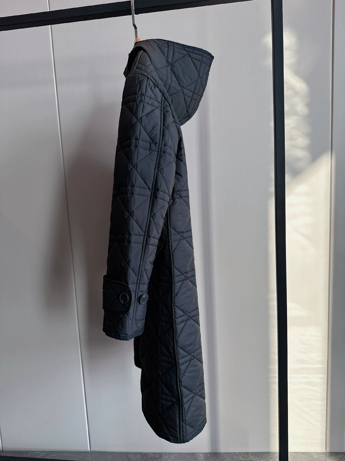 Black down jacket with diamond pattern, hoody with hood, 2023 collection