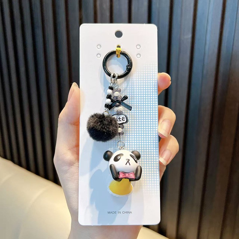 팬더 털볼 펜던트-옐로우 스커트