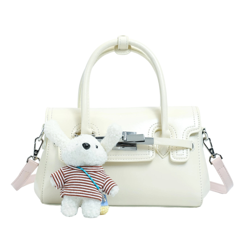 Bolso cuadrado pequeño exquisito, bolso de mano simple, 2026 nuevo tipo de tela, bolso de hombro de mujer, sensación diaria, bolso de hombro universal