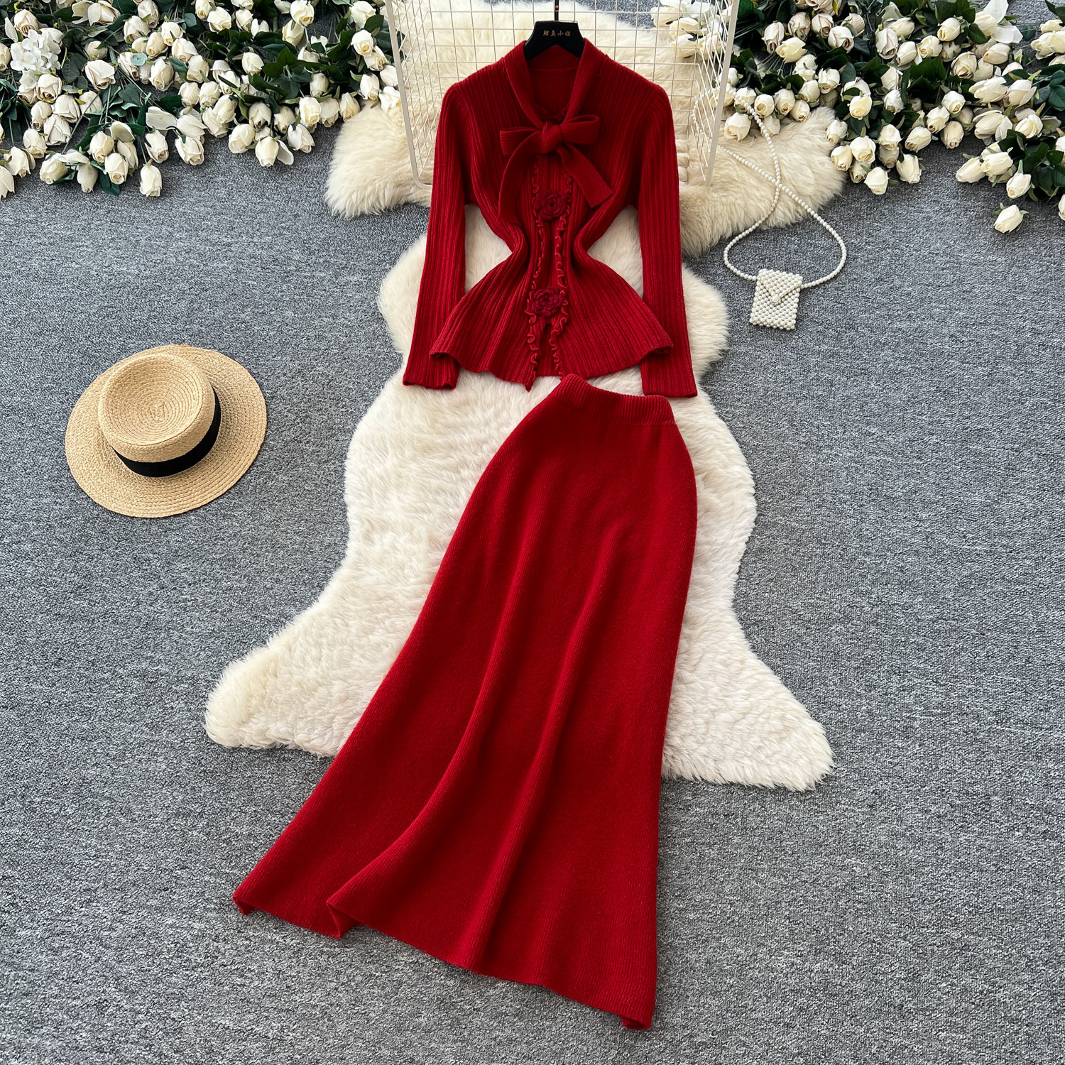 red knitted set with bow