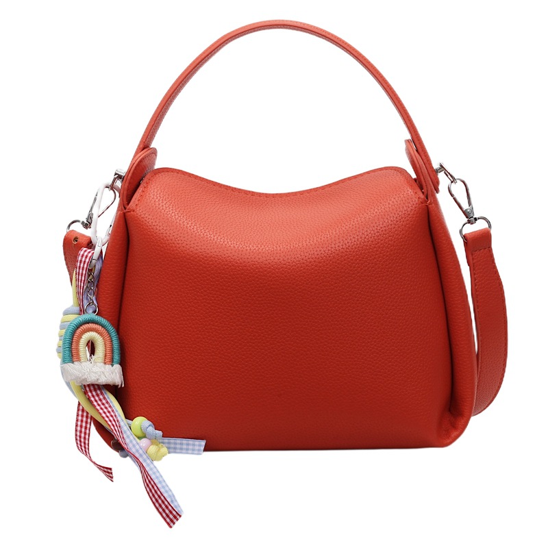 Bolso pequeño de mano para mujer 2025 nuevo bolso de mensajero de hombro de moda de lujo ligero bolso de caja de almuerzo de alta gama de nicho bolso de cubo