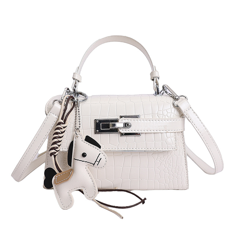 Bolsos de textura de nicho de cocodrilo de alta calidad, bolsos de mujer 2026 nuevos bolsos de mochila, bolsos de bloqueo de moda