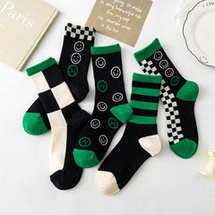Black and white plaid socks with color-blocked vintage smiley-face design, green for women—Instagram-style, trendy checkered mid-calf sports socks for men, also available as long-tube versions.