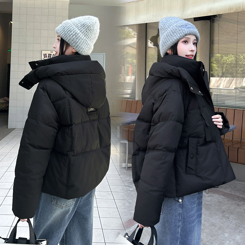 Invierno plumón de algodón mujer 2025 nuevo abrigo de algodón con capuz suelto hombre pequeño chaqueta de algodón de moda de pan coreano image 2