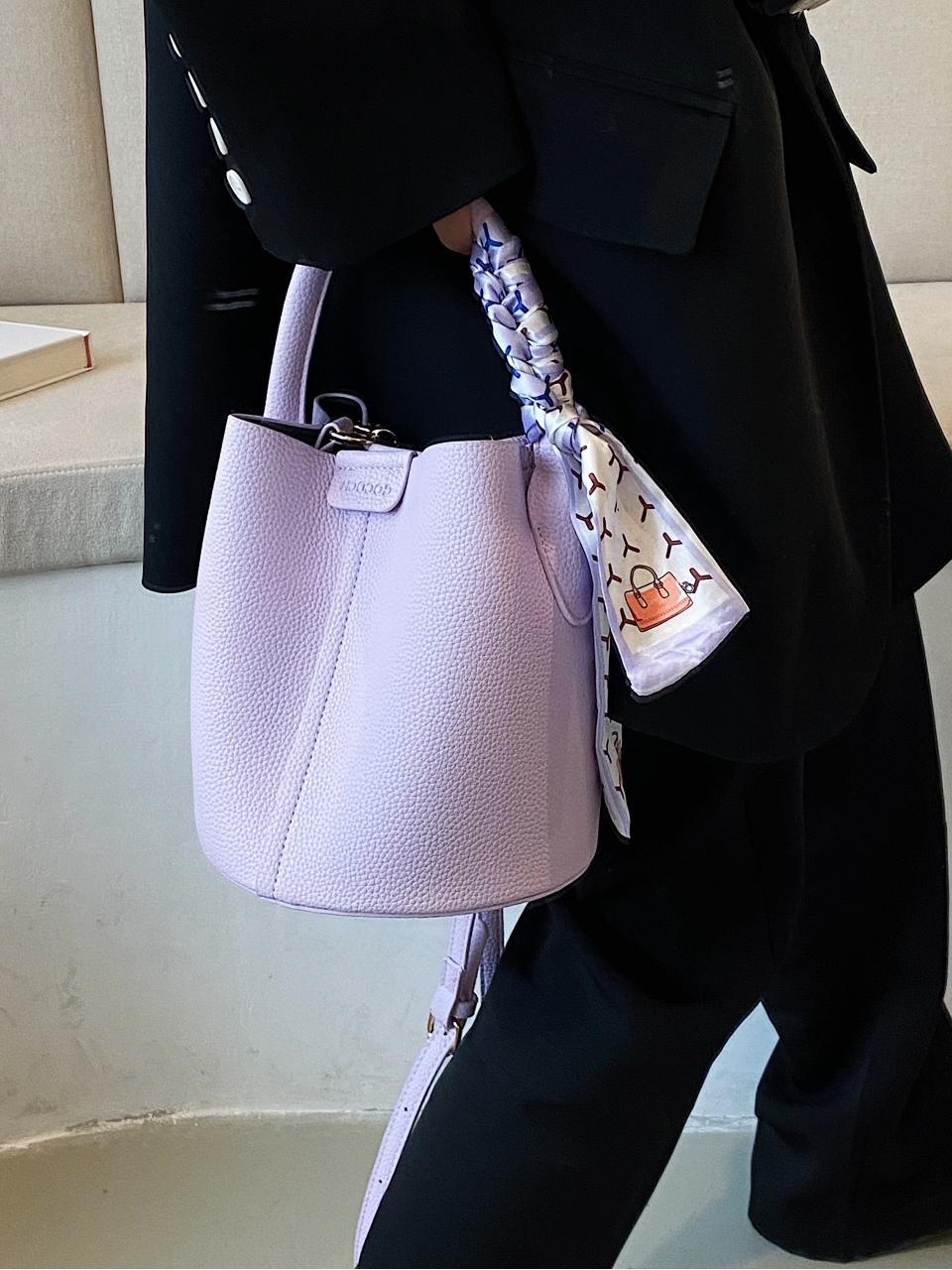 Bolso de cubo de mano de estilo explosivo transfronterizo 2025 nuevo bolso de hombro de tendencia simple popular bolso de mensajero de alta gama súper caliente